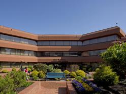 Front of the Miles W. Connor Administration building on a sunny day on the Coppin State University campus