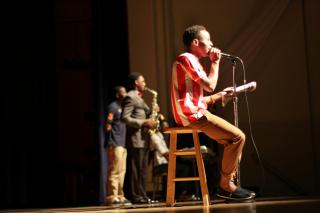 student with microphone