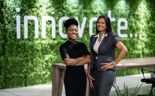 Two women posing for the camera