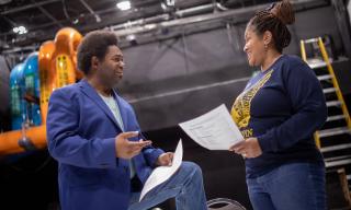 Two students rehearsing in the Black Box Theater